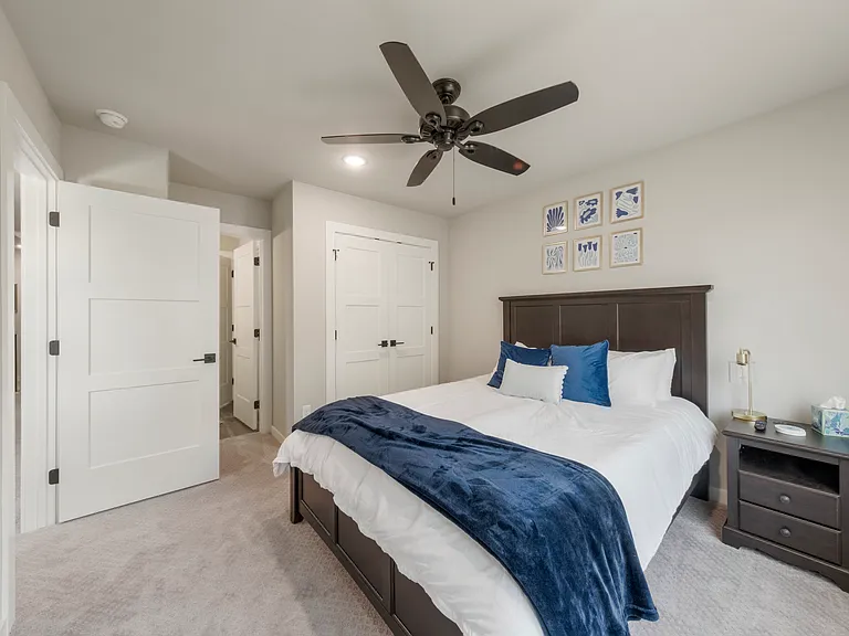 Third bedroom includes queen sized bed, furnishings, large closet and TV