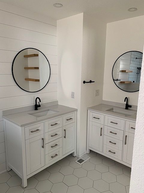 Primary Bathroom with two sinks, walk-in closet and gorgeous walk-in shower