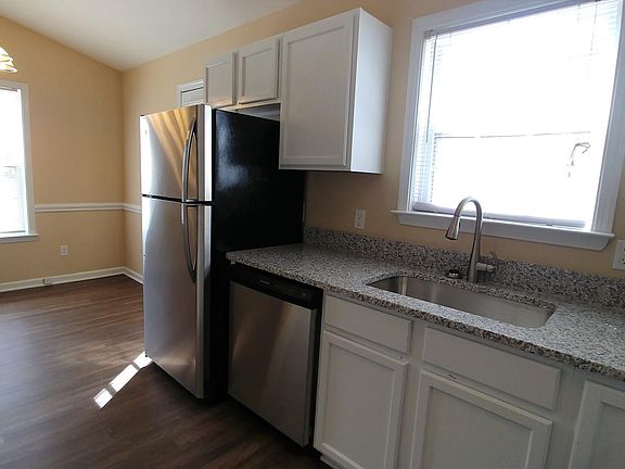 Kitchen opens to breakfast nook