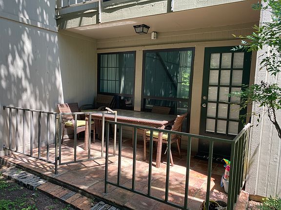 Gated patio with direct access to the pond and great bird watching.