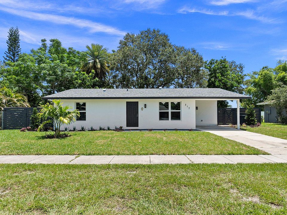 1st image of 317 NE Floresta Drive