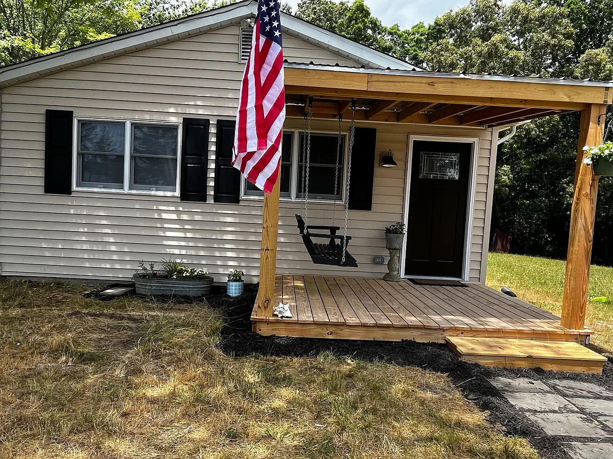 Side entry with covered deck (entry from parking area) - 14930 Hardship Farm Pl