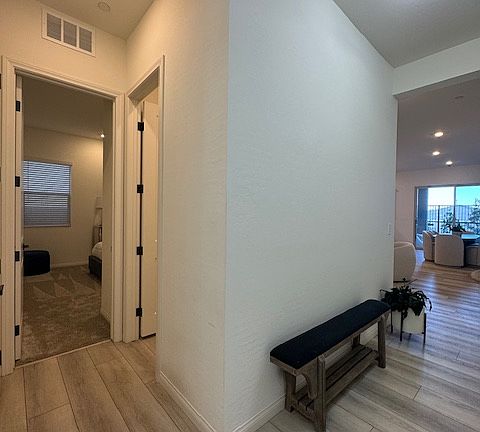Hall to Downstairs Bedroom and full bath