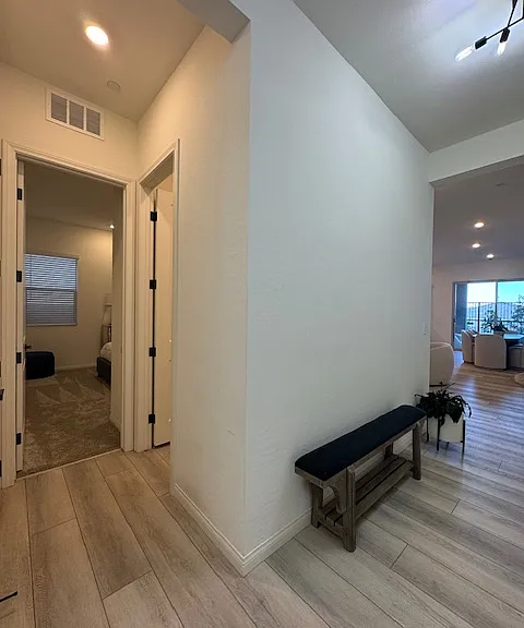 Hall to Downstairs Bedroom and full bath
