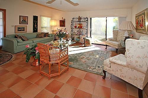 Tiled Living Room with Open Patio