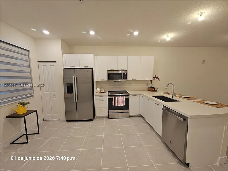 6453 NW 102nd Path #103 — Photo 11