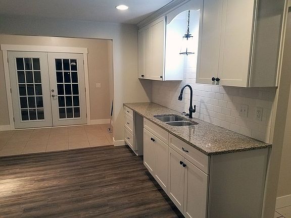 Solid KraftMaid & granite.