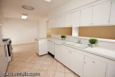 Kitchen now has BLACK GRANITE