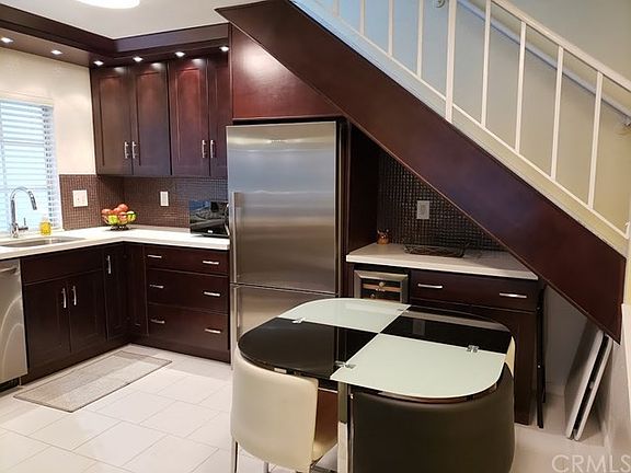 Gorgeous upgraded kitchen with plenty of cabinetry and accent lighting.
