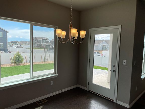 Dining nook with access to backyard and patio