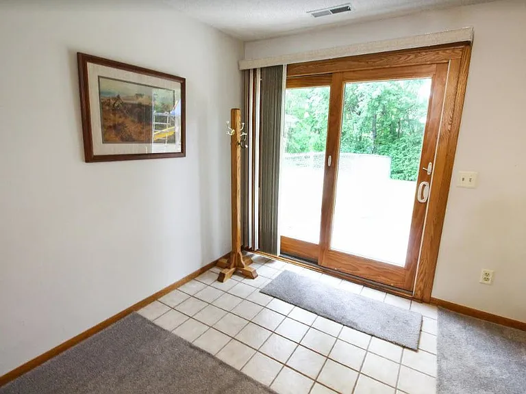 Walkout to fenced area and access to backyard