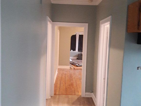 Hallway from kitchen/bedrooms to living room and dining room.