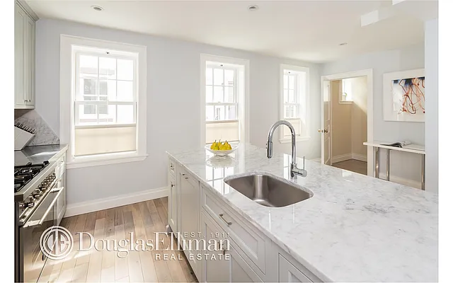 Sold by Douglas Elliman | media 13