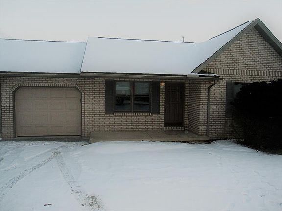 Drive with turn around, attached garage with keyless entry