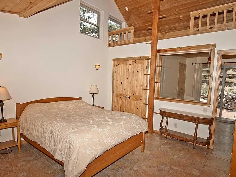 Master Bedroom with loft, steam shower and walk in closet.