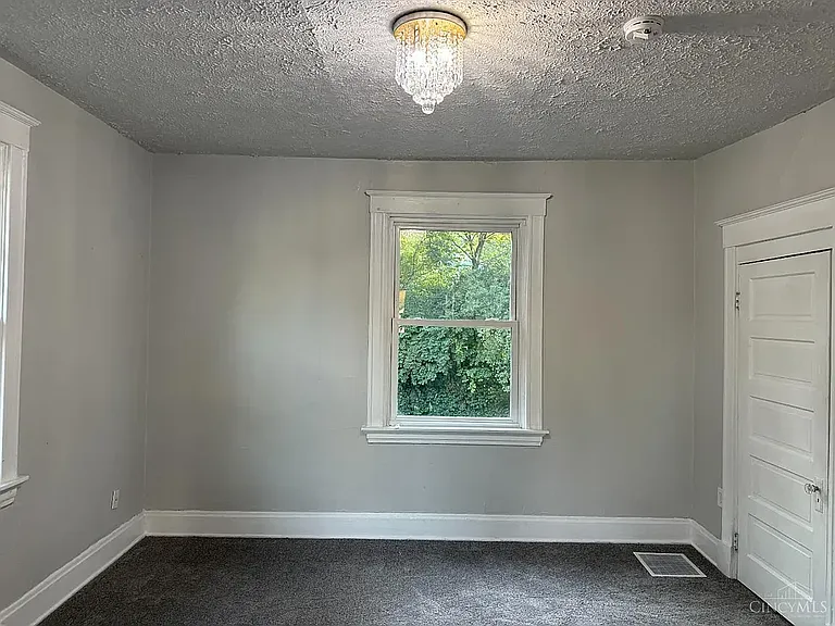 9' x 11' Bedroom with 9' ceiling and two closets