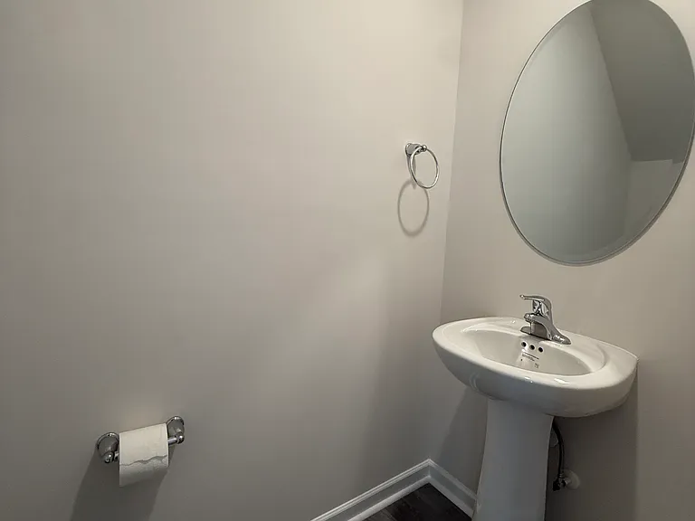 Half Bathroom. (Between Living Room and Kitchen Areas.)