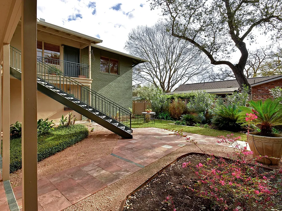Beautiful landscaping creates a tranquil vibe as well as privacy