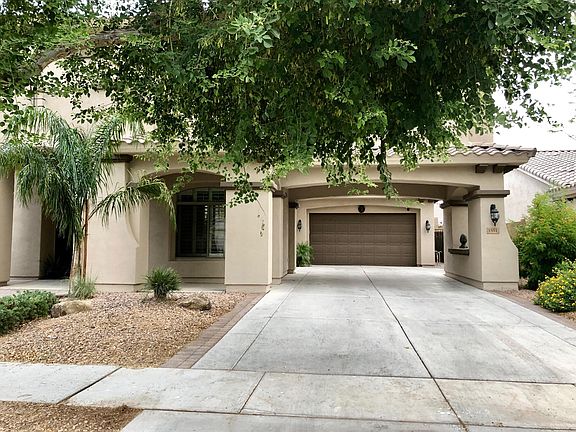 Covered driveway can accommodate 4+ cars