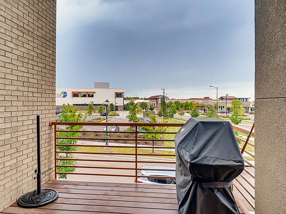 Balcony. 
FYI: HOA will no longer permits BBQ grills on balconies.