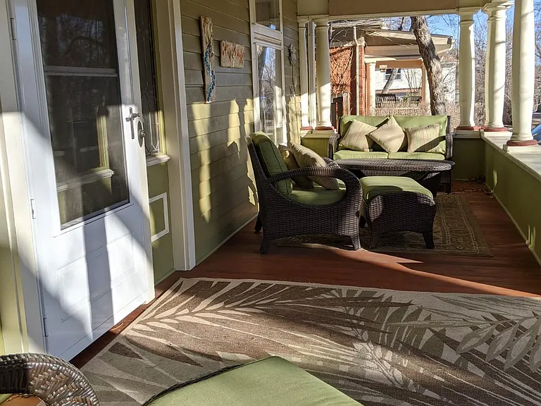 East facing front porch, perfect for morning coffee, evening meals.