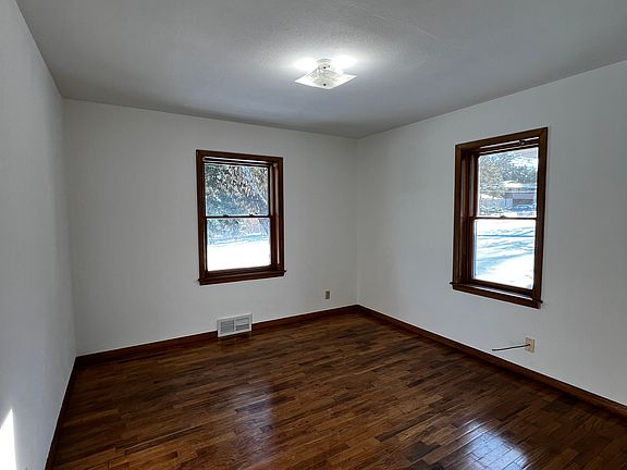 3-bedrooms; front bedroom with two windows, one to the south and one to the east and large closet, back bedroom with two windows one to backyard and other facing southwest and a lighted walk-in closet