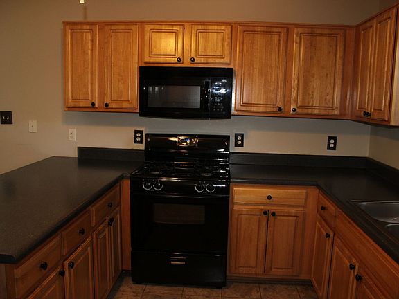 closeup of kitchen showing gas stove