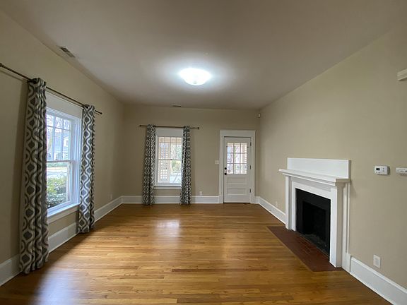 Living room view from dining room towards front of house