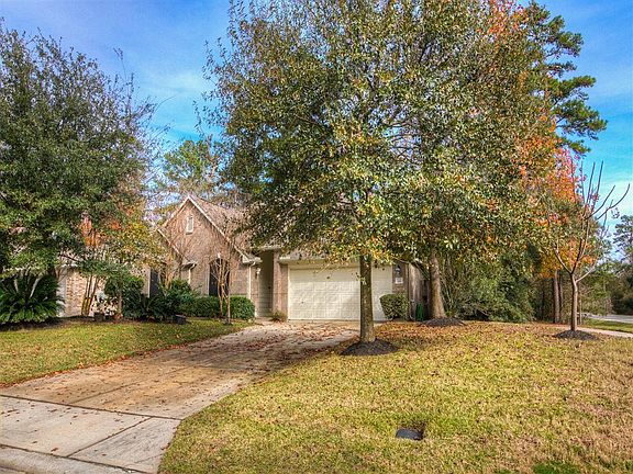 Private, peaceful lot situated next to the greenbelt and lined with trees