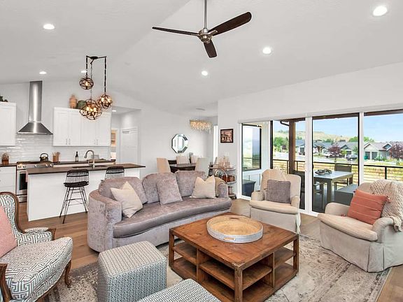 Kitchen and living room with french doors to deck