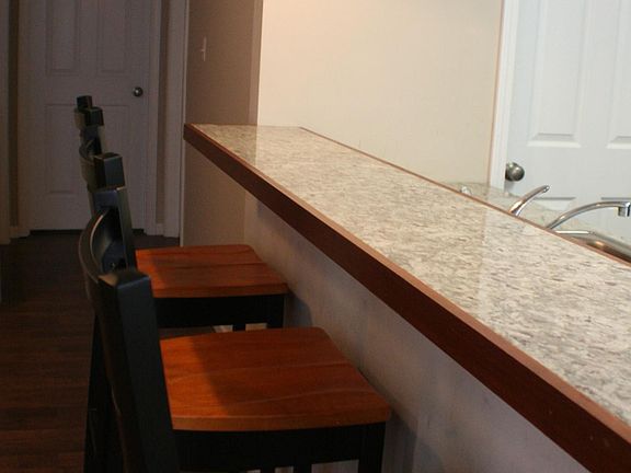Kitchen counter top with bar stools