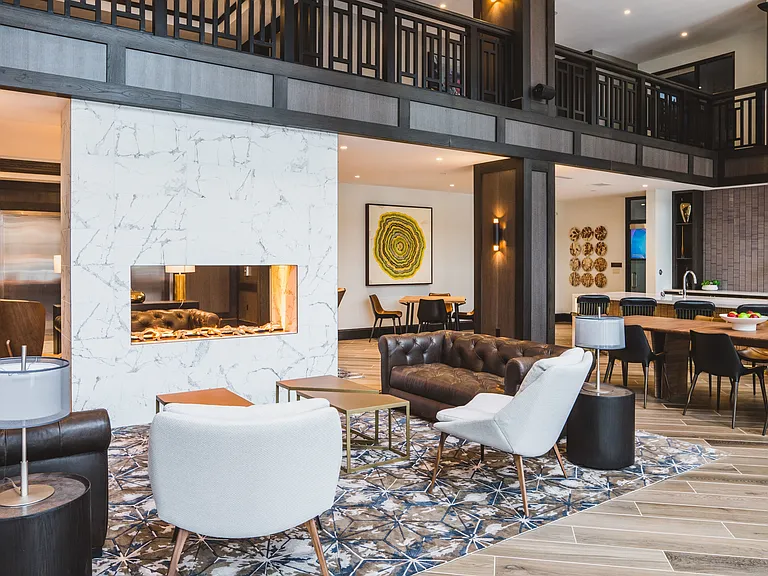 Expansive clubroom with gathering space and demonstration kitchen