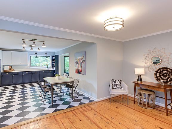 Upstairs entryway, open remodeled kitchen.