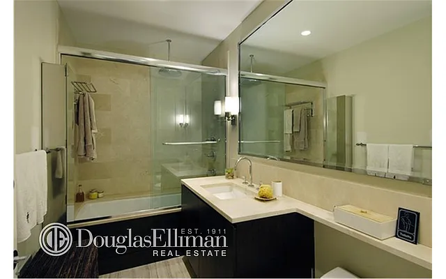 Sold by Douglas Elliman | media 12