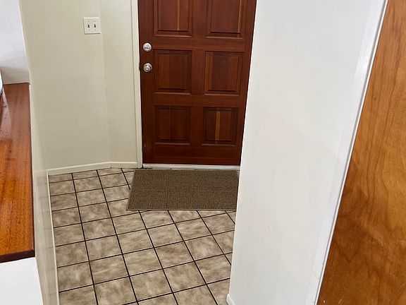 Entry Hall and front door from inside unit.