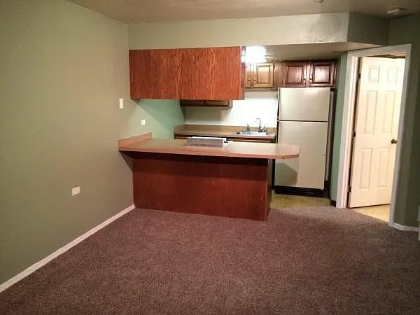 The kitchen (from the door). The fridge has been updated (as seen in other photos).
