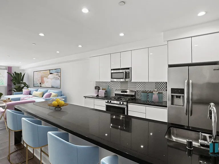 Kitchen with Large-Size Countertop Bar and Open-Concept Floor Plan
