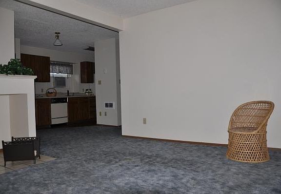 Living area looking into dining/kitchen
