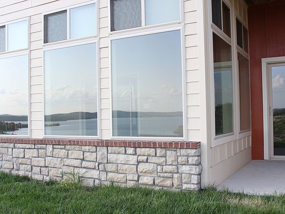 Sunroom Windows reflect Lake