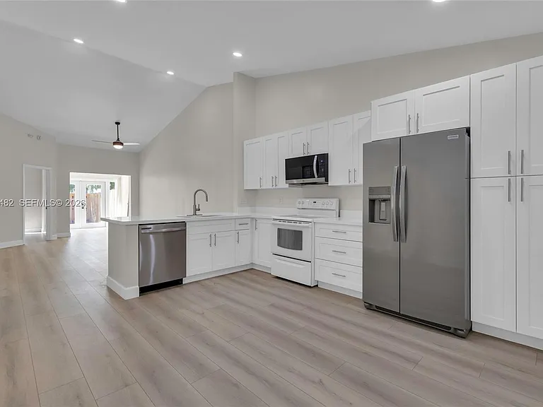 11061 NW 38th Pl — Photo 7