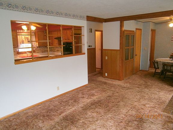 Flows into kitchen area