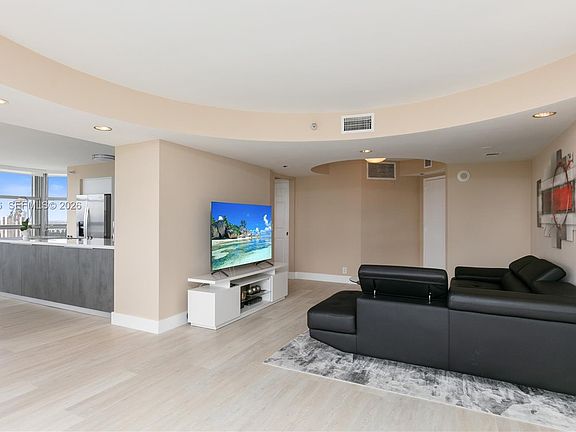 3rd image of 3500 Mystic Pointe Dr APT 2603