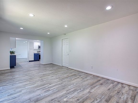 View from family room to kitchen.>