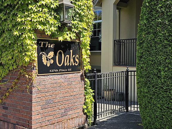 The house is located at The Oaks Community entrance.