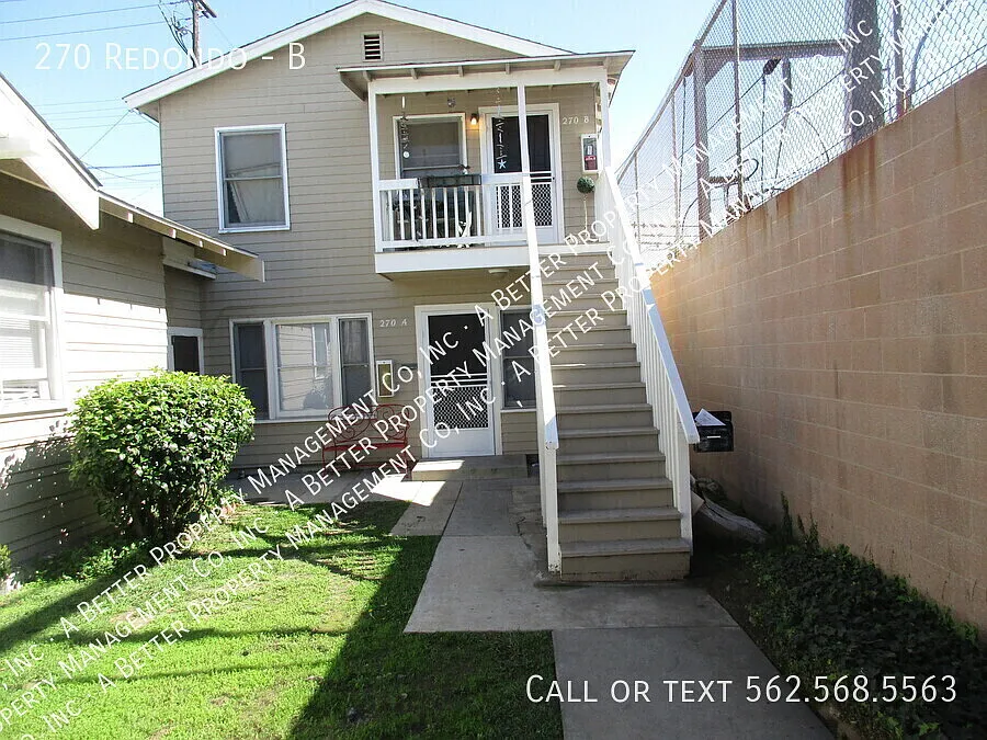 Upper One Bedroom in Triplex with Refinished Hardwood Floors — Photo 3