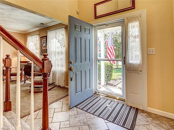 Lovely Ceramic Tile Entry flows all through the Foyer, Dining Room,   Kitchen, Breakfast Area, Laundry Room & Half Bath