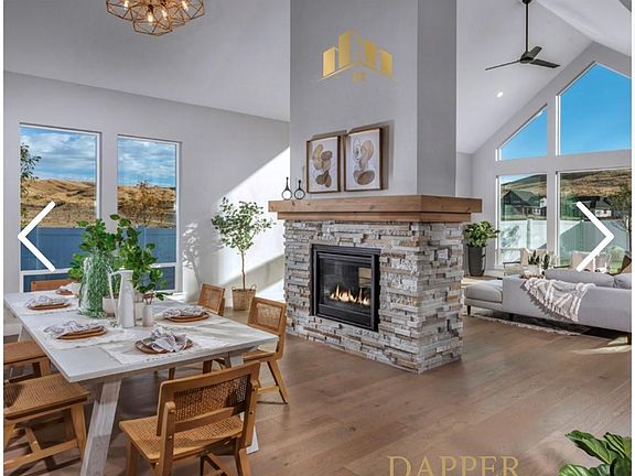 Example photo of fireplace area. Actual fireplace stone goes up to ceiling.