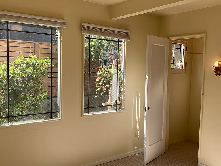 Main floor bedroom with plenty of light