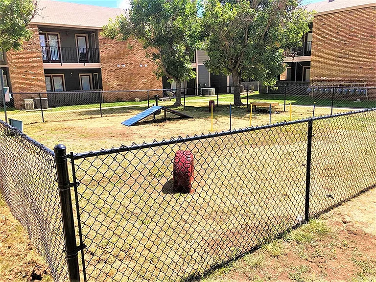 Take Your Furry Friend To Our Private Dog Park