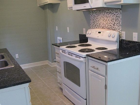 Kitchen with Granite and Tile